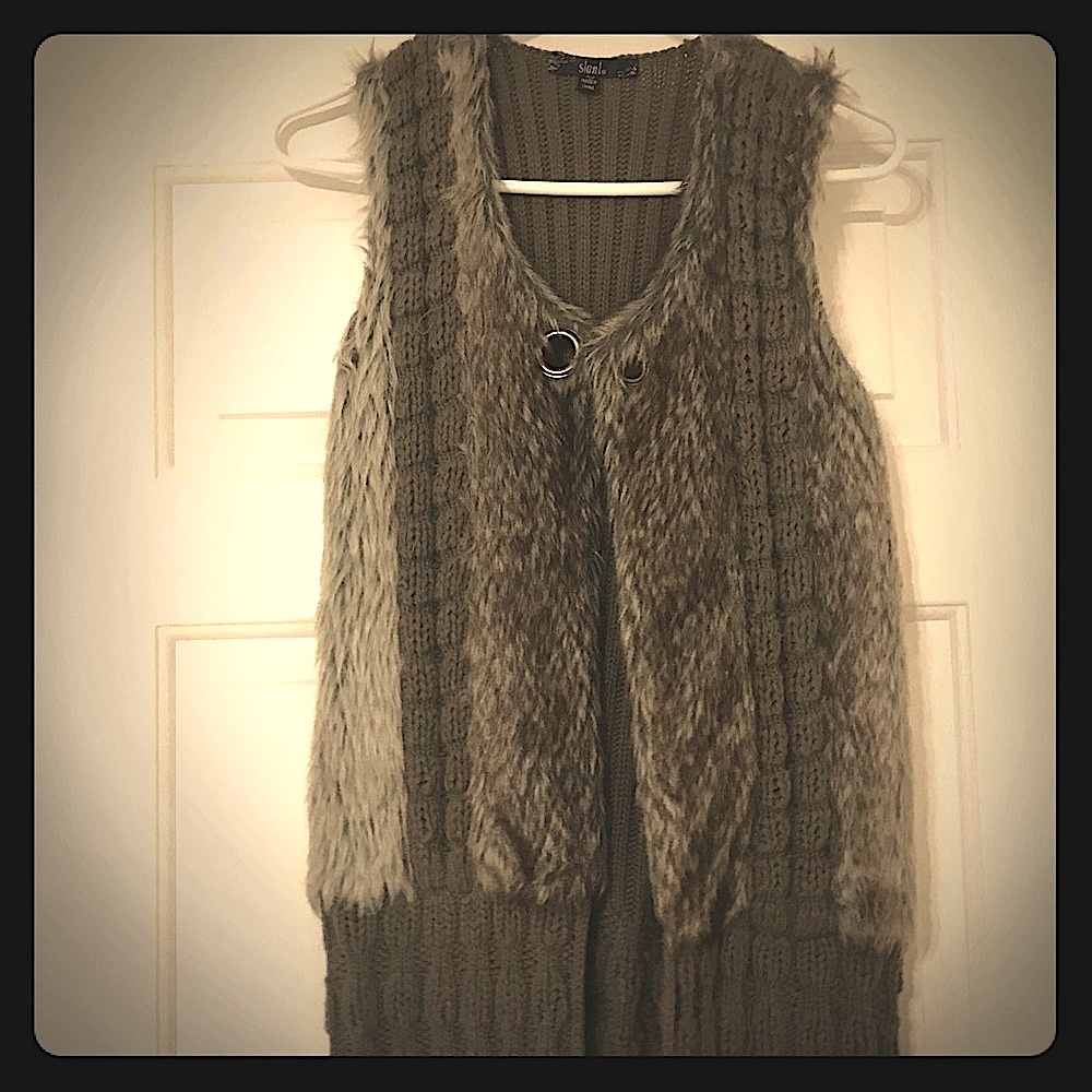 Faux fur gray and beige sweater vest.